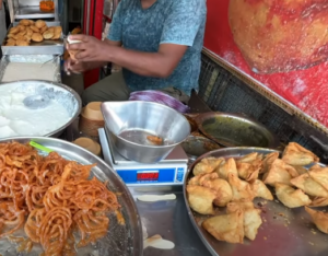 Assortment of traditional Indian sweets displayed at Maura Mishtan Bhandar, a renowned sweet shop in Ayodhya known for its authentic flavors.