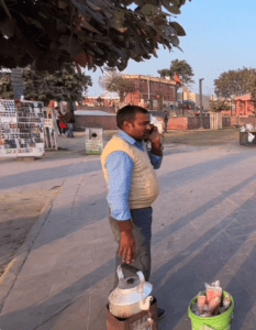 Vendor at Ram Ki Paidi serving refreshing lemon tea, locally known as 'nimbu wali chai,' for ₹10. A simple and delightful drink to enjoy while exploring the area.