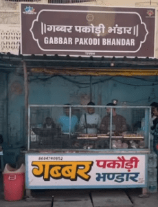 Gabbar Pakodi shop in Ayodhya, bustling with locals and tourists eager to taste the famous street food