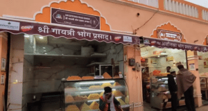 Traditional prashad offerings, including sacred ladoos 