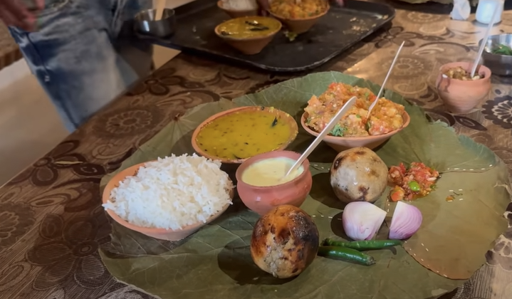 Step into a traditional village at Pallvai Dal Batti Chokha Restaurant in Ayodhya.