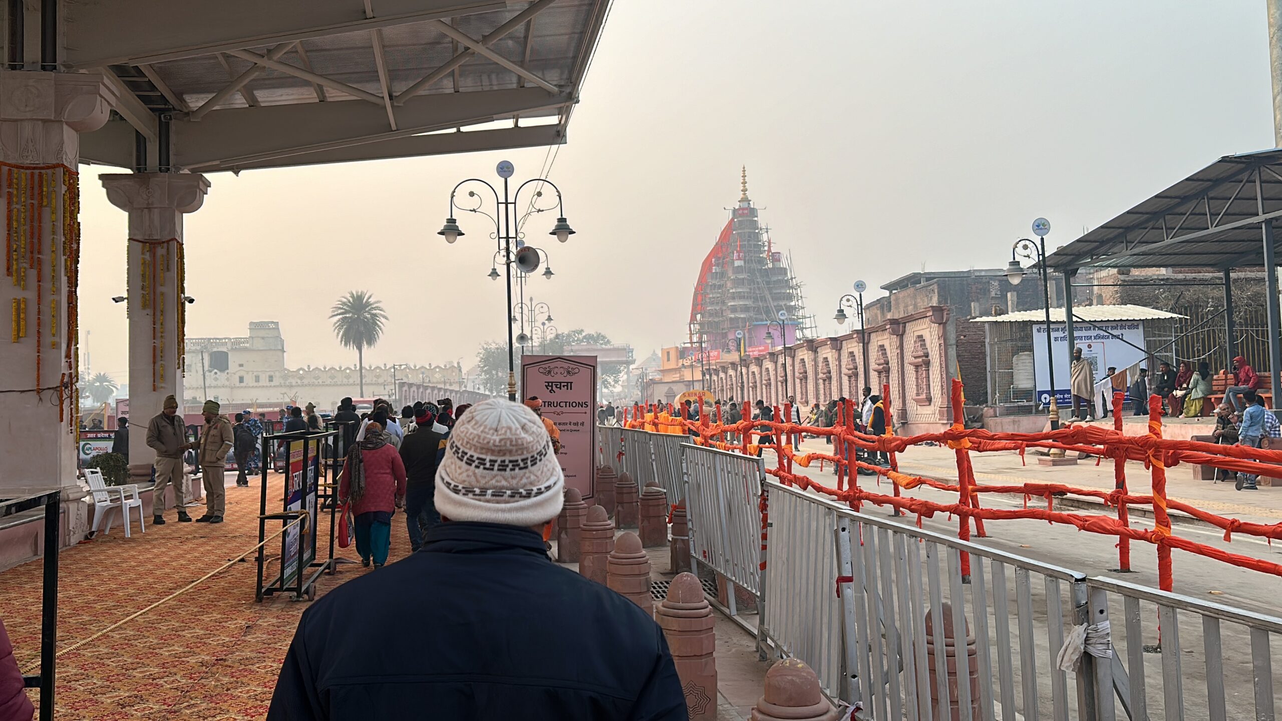 Entrance to Ram Janmabhoomi Temple with visitors entering the premises.